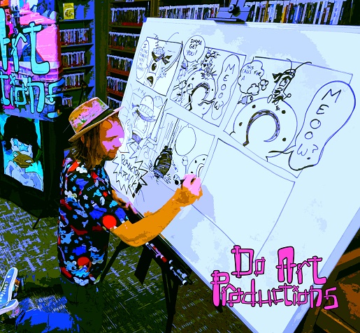 Man drawing a comic panel on a large easel with text that reads Do Art Productions